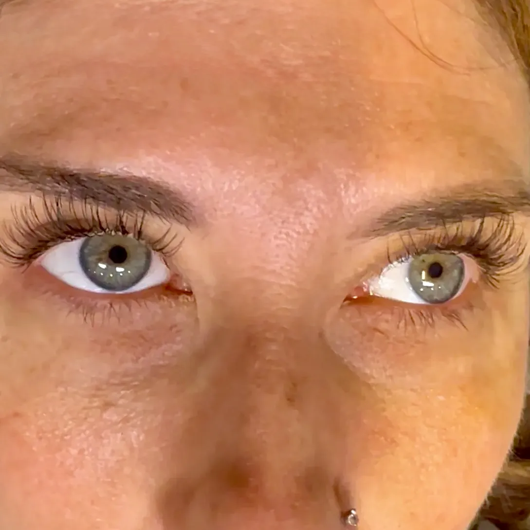 Lash extensions on both eyes, mapped so the two lash lines match each other